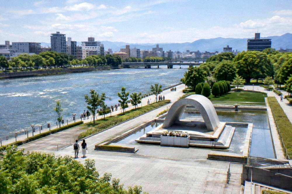 The Cenotaph for the A-Bomb Victims in Hiroshima Peace Memorial Park under a clear sky