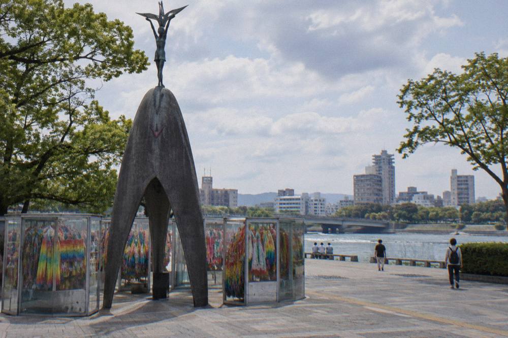 The Children's Peace Monument in Hiroshima Peace Memorial Park with a girl figure holding a crane aloft