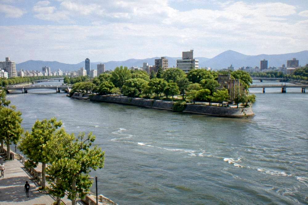 Rivers meeting around the green Nakajima district in central Hiroshima seen from above
