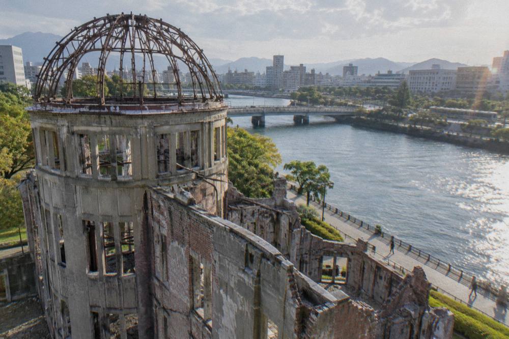 Close view of the dome's bare steel frame and shattered brick walls