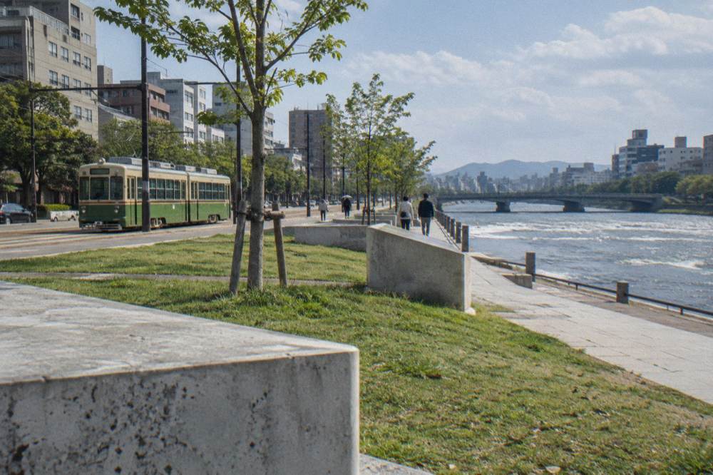 A Hiroden streetcar passing through central Hiroshima near the Peace Park