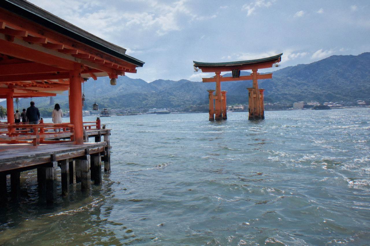 The Great Torii gate of Itsukushima Shrine standing in the water off Miyajima island