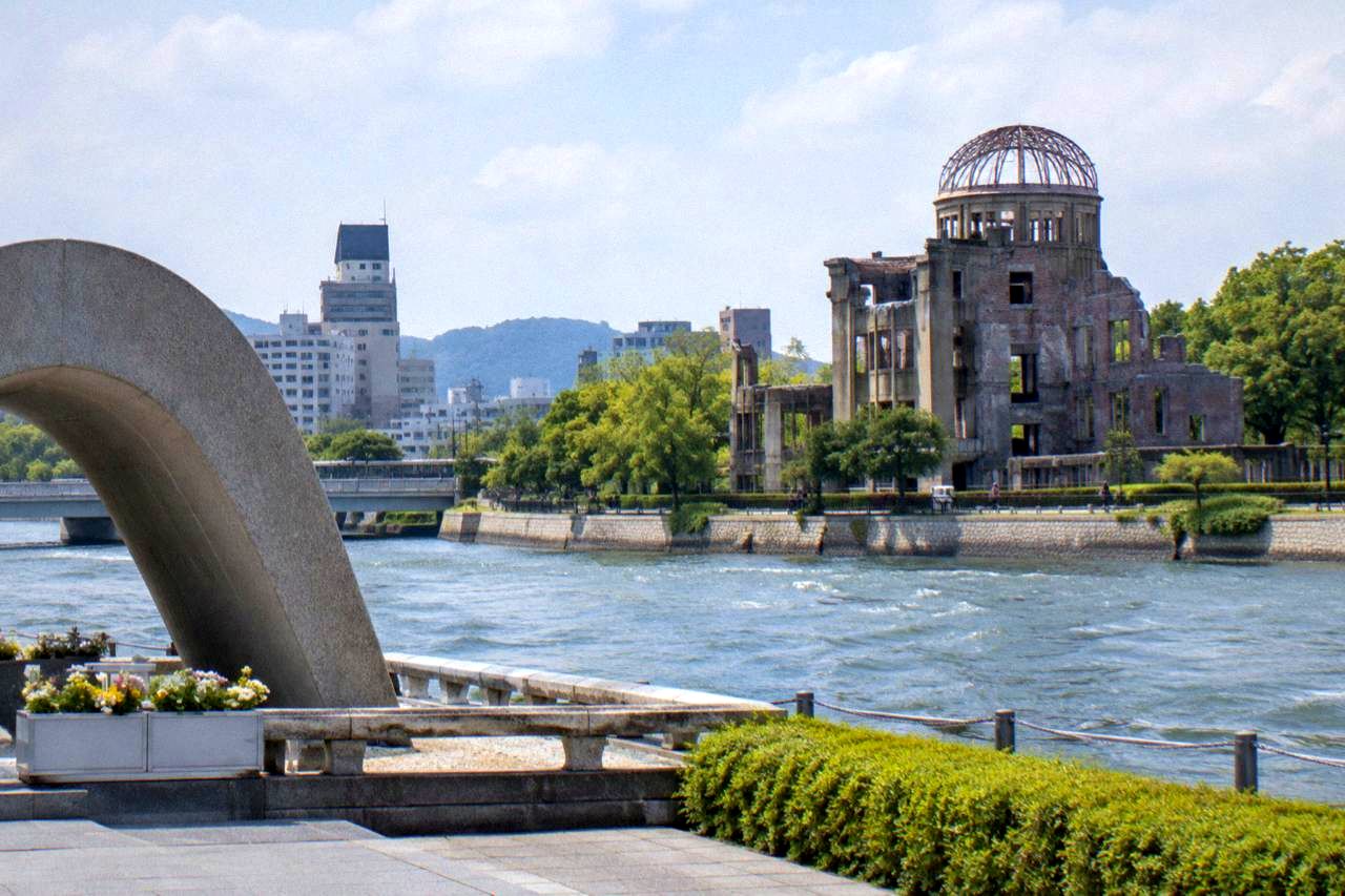 The Peace Memorial Park in Hiroshima with the Cenotaph framing the A-Bomb Dome across the river