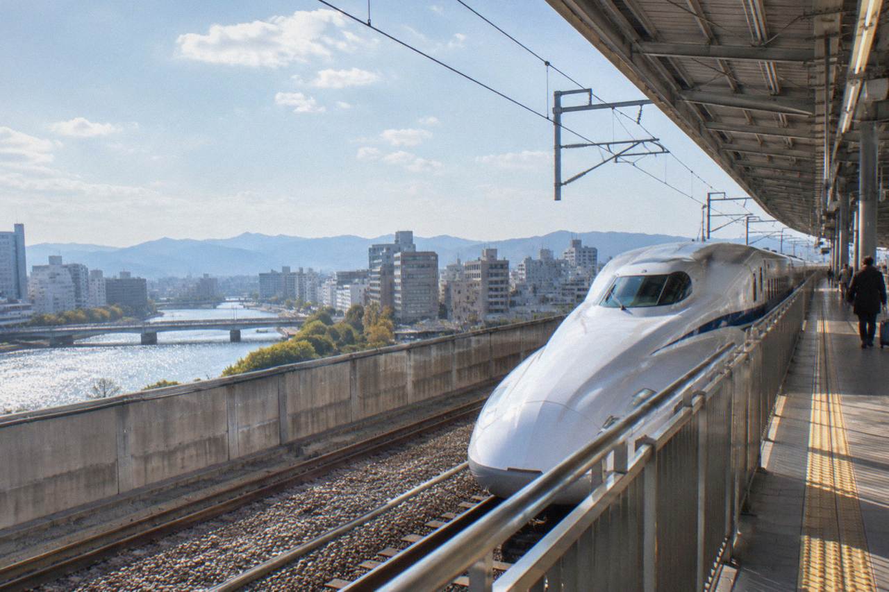 A Shinkansen bullet train platform at Osaka Station seen along the track