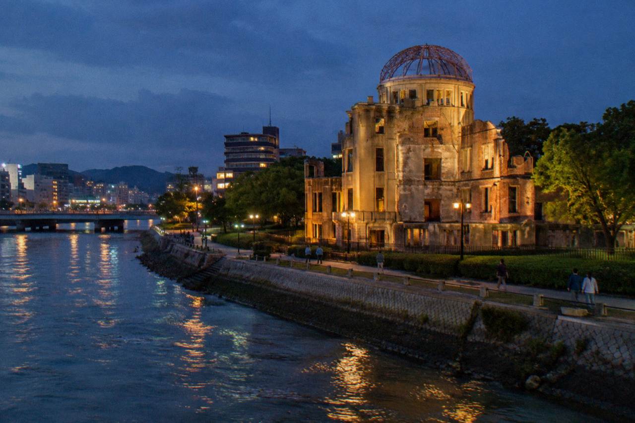 The Atomic Bomb Dome beside the Motoyasu River in Hiroshima at dusk