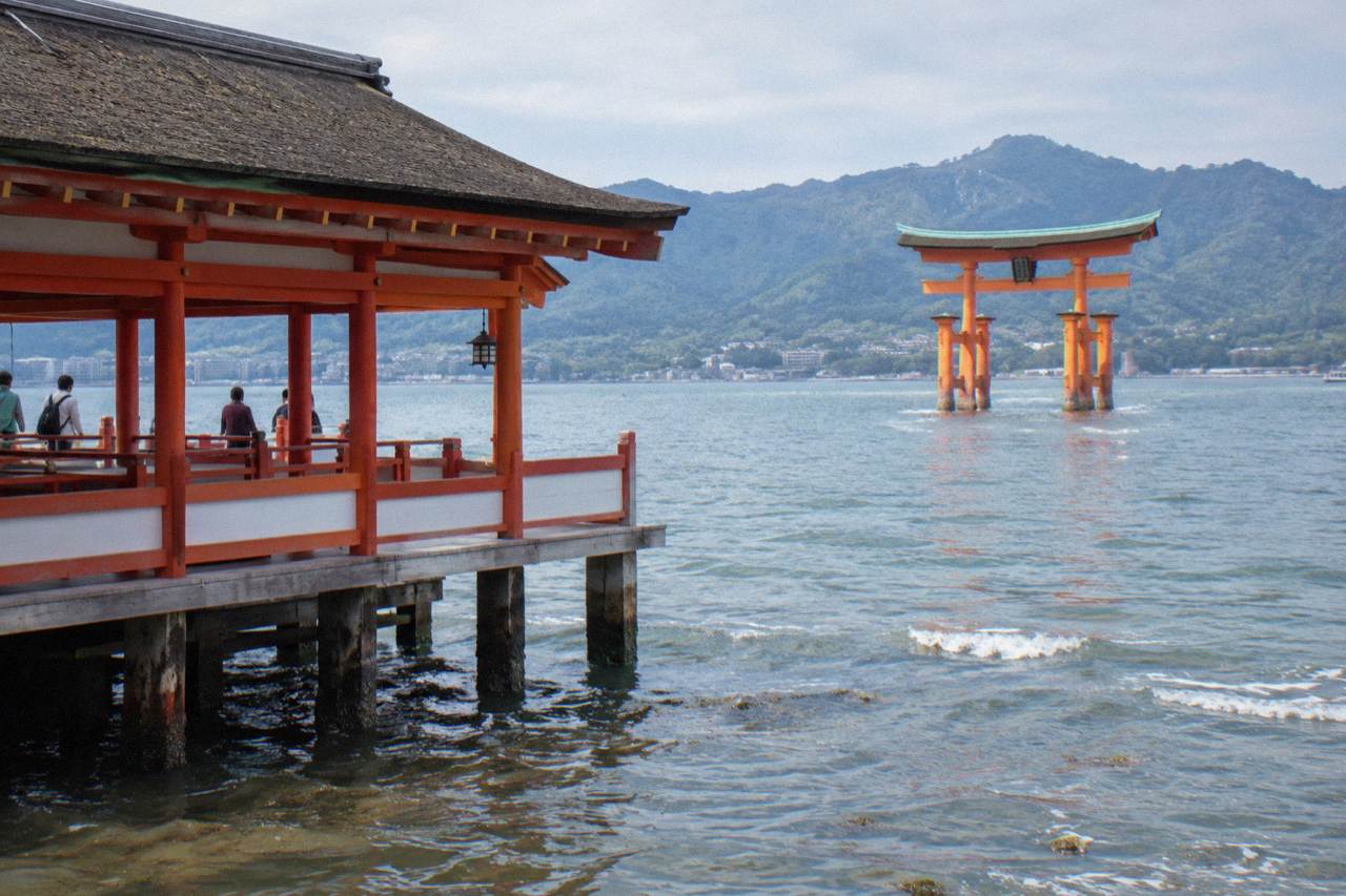 The floating Great Torii gate of Itsukushima Shrine standing in the water at Miyajima