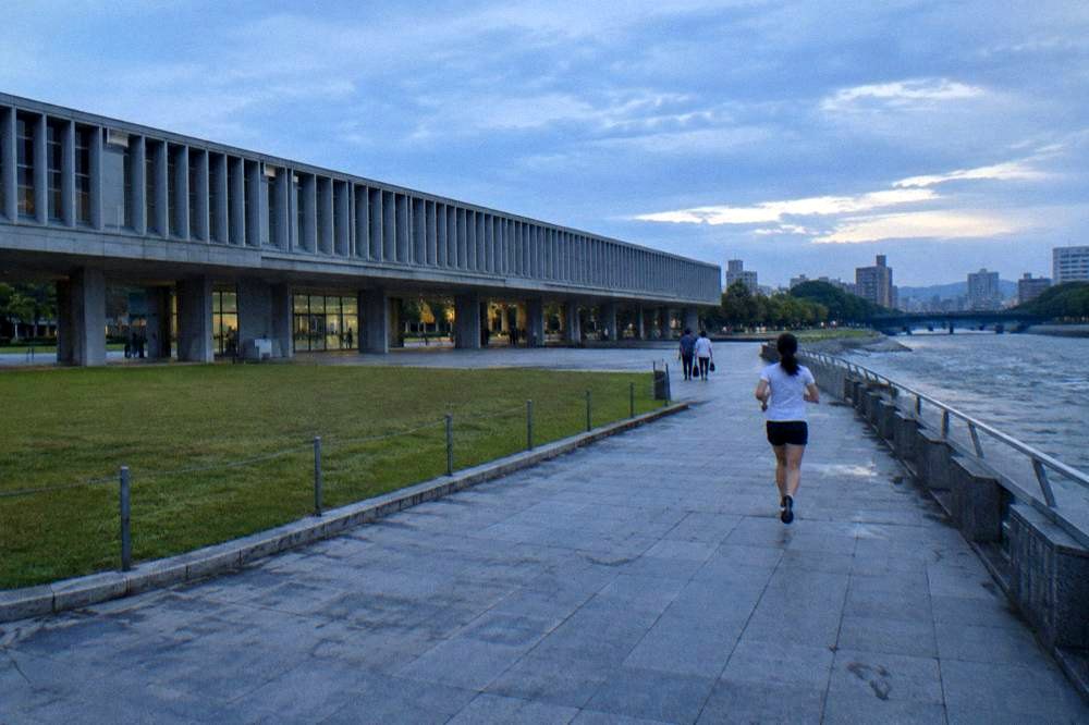 Visitors walking quietly through Peace Memorial Park