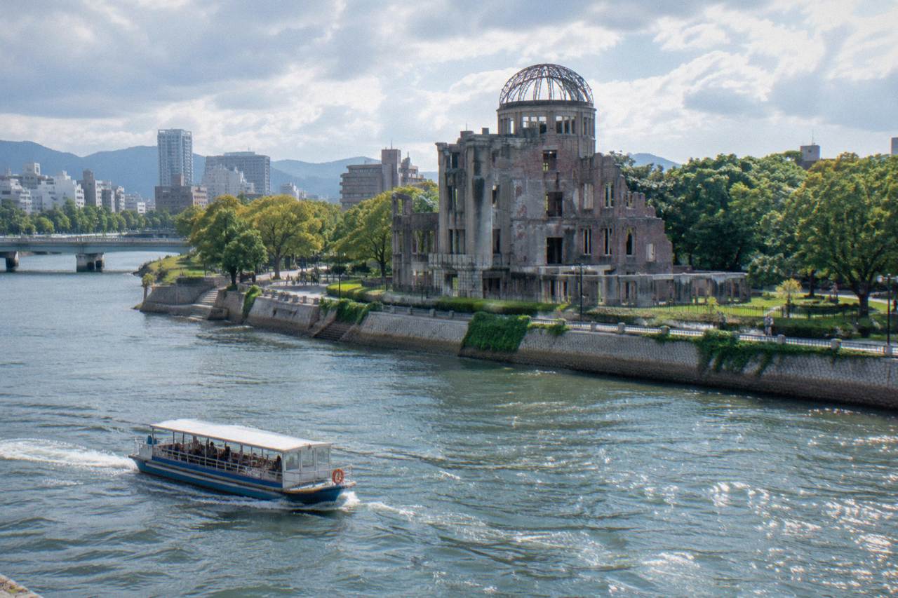 The Atomic Bomb Dome in Hiroshima seen across the river in soft morning light